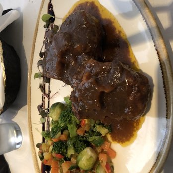 KEBO Restaurant - Oxtail stew and side of vegetables - Spanish Near Me - Key Biscayne, Florida KEBO Restaurant - Oxtail stew and side of vegetables - Spanish Near Me - Key Biscayne, Florida