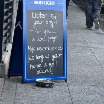 Cairde Public House Bar & Restaurant - Sign to advertise water for the dog - Bars Near Me - Seattle, Washington