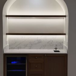 360 Counters - Kitchen bar area. Coffee bar. Full height Quartz backsplash.