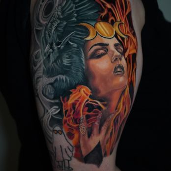 Selfcultured Tattoo - This tattoo merges fiery hues with ethereal smoke, portraying a powerful figure crowned by a raven's watchful gaze - Tattoo Near Me - Upland, California Selfcultured Tattoo - This tattoo merges fiery hues with ethereal smoke, portraying a powerful figure crowned by a raven's watchful gaze - Tattoo Near Me - Upland, California