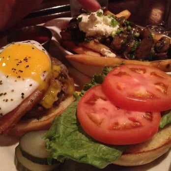 Nicholson's Fine Food & Whiskey - Bacon & Egg burger with their mushroom ragu/goat cheese Poutine! - Pubs Near Me - Cincinnati, Ohio