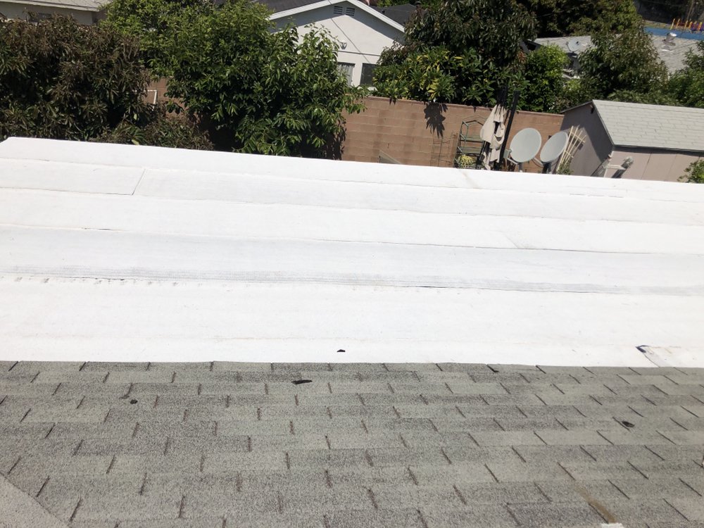 Slide of Frank Delgado Roofing