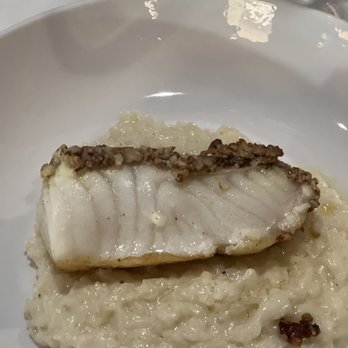 One Thirty Five Prime - Pecan crusted Chilean sea bass with Parmesan risotto - Steakhouses Near Me - Waco, Texas