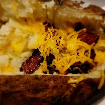Vic & Anthony's Steakhouse - Baked potatoes with crazy thick bacon - Steakhouses Near Me - Lake Charles, Louisiana Vic & Anthony's Steakhouse - Baked potatoes with crazy thick bacon - Steakhouses Near Me - Lake Charles, Louisiana