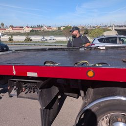 David getting my vehicle ready to go up on the truck bed.