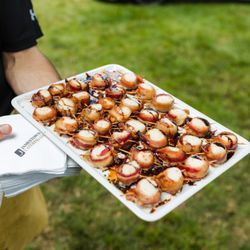 Jamestown Catering - Passed bacon-wrapped scallops appetizer served by Jamestown Catering staff at an event in Wilmington, Delaware.