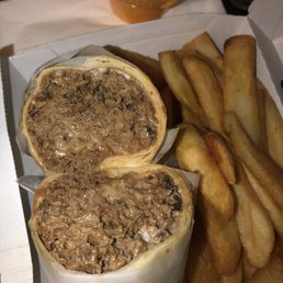 Cheesesteak wrap extra meat and cheese with mushrooms.