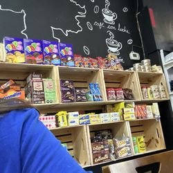 Tu Empanada Xpress Cafe - Wall of products