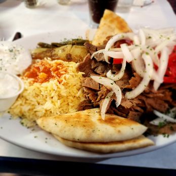 Hellas Restaurant - Gyro Platter Served with pita, meat, onions, tomatoes and sauce - open face. - Bakeries Near Me - Tarpon Springs, Florida