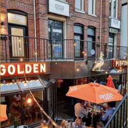 The Golden Pigeon - Patio/Bar Area