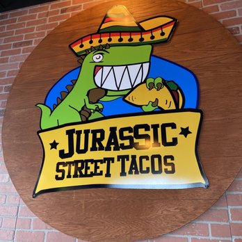 Jurassic Tacos Orem - a sign for jurassic street tacos - Tacos Near Me - Orem, Utah