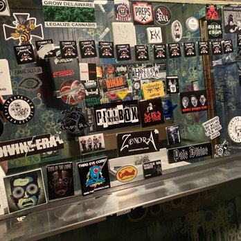 Bar XIII Delaware - a wall full of stickers - Music Venues Near Me - Wilmington, Delaware