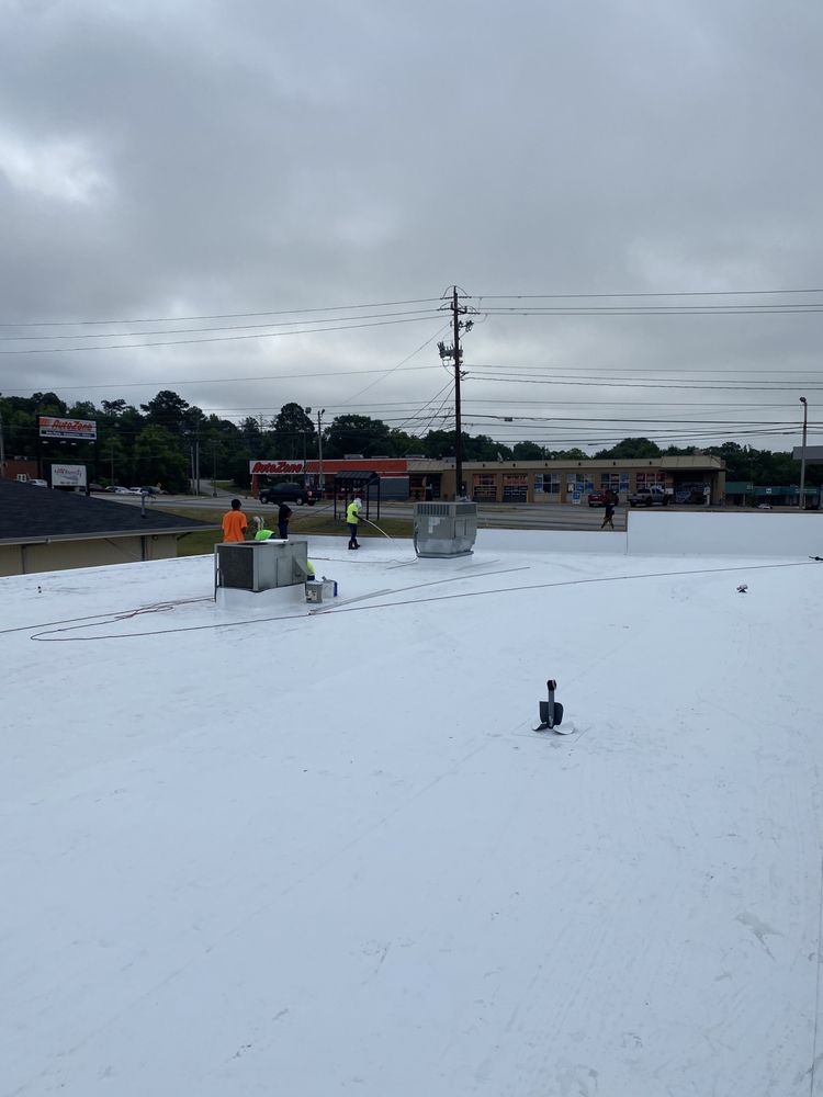 Slide of Ray’s Commercial Roofing Construction