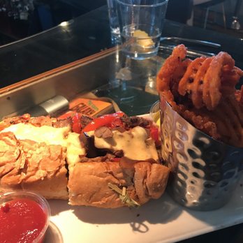 Root Down DIA - Philly Steak! - New American Near Me - Denver, Colorado Root Down DIA - Philly Steak! - New American Near Me - Denver, Colorado