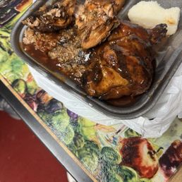 Two pieces of chicken thighs, dark meat.