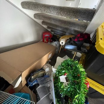 House Organized - Under the stairs, before - Home Organization Near Me