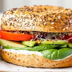29 Yum - Veggie bagel sandwich with avocado, tomatoes, cream cheese