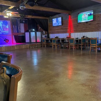 The 159 Junction - Dance floor, stage and dining tables - Sports Bars Near Me - Fayetteville, Texas The 159 Junction - Dance floor, stage and dining tables - Sports Bars Near Me - Fayetteville, Texas