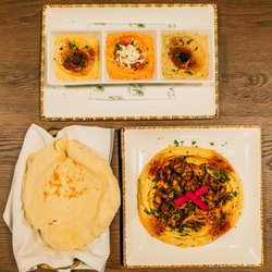 The Green Olive - Dip trio and hummus with pita bread