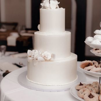 Icings by Linda - a three tiered wedding cake - Cupcakes Near Me - Hadley, Pennsylvania Icings by Linda - a three tiered wedding cake - Cupcakes Near Me - Hadley, Pennsylvania