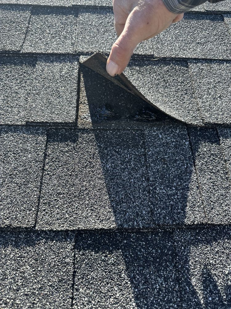 Slide of New Vallee Roofing