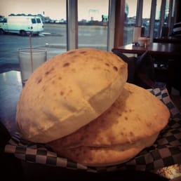 Freshly prepared pita... Warm and puffed up! Freshly prepared pita... Warm and puffed up!