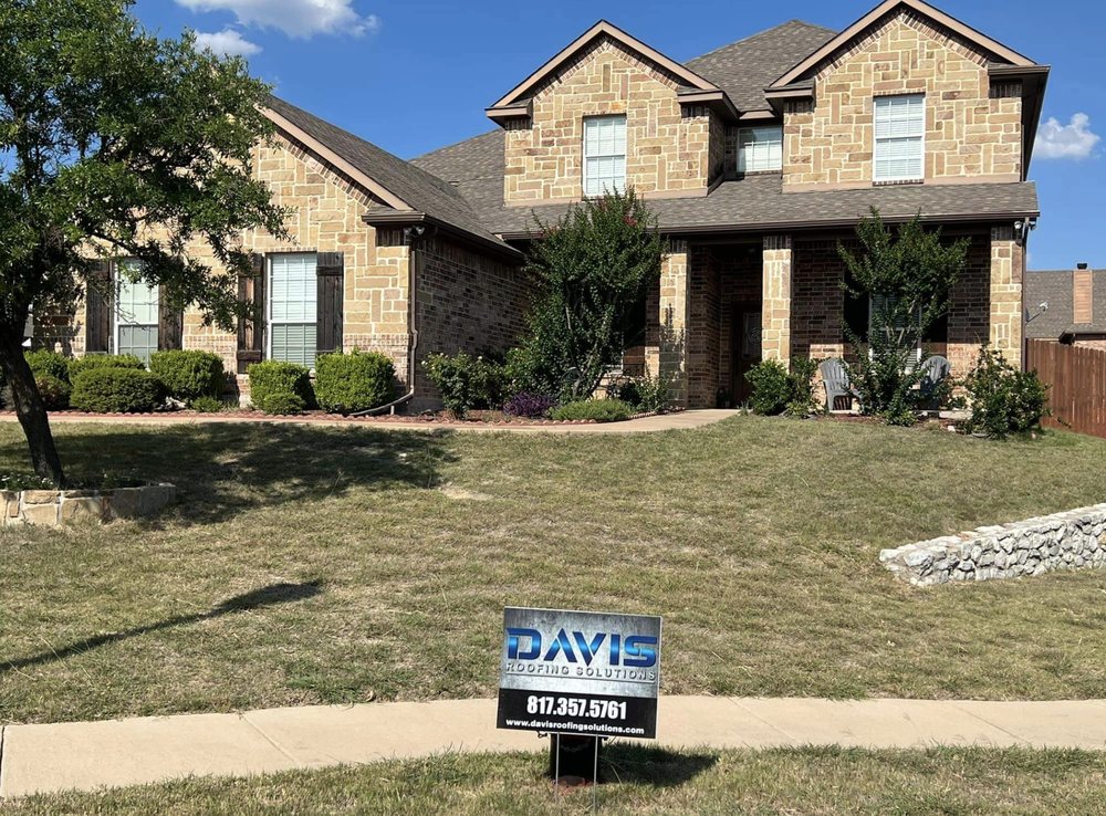 Slide of Davis Roofing Solutions