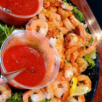 The Dahlia - shrimp, lettuce, and tomato sauce on a plate - Gastropubs Near Me - Lynchburg, Virginia The Dahlia - shrimp, lettuce, and tomato sauce on a plate - Gastropubs Near Me - Lynchburg, Virginia