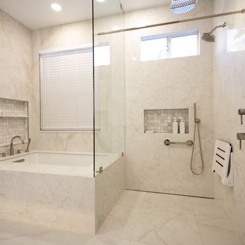 Thrive Home Construction - Curb-less shower with a soaking tub. Quartz Surrounding panels. Signature plus fixtures. - General Contractors Near Me - Sacramento, California Thrive Home Construction - Curb-less shower with a soaking tub. Quartz Surrounding panels. Signature plus fixtures. - General Contractors Near Me - Sacramento, California