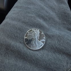 Qwik Pawn - Silver fake coin