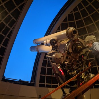 Griffith Observatory - Main telescope and Griffith staff/guide. - Observatories Near Me - Los Angeles, California Griffith Observatory - Main telescope and Griffith staff/guide. - Observatories Near Me - Los Angeles, California