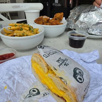 Mitchs Downtown - truffle fries, sesame bagel scrambled eggs American cheese and bacon and French toast - Bagels Near Me - Fort Lauderdale, Florida Mitchs Downtown - truffle fries, sesame bagel scrambled eggs American cheese and bacon and French toast - Bagels Near Me - Fort Lauderdale, Florida