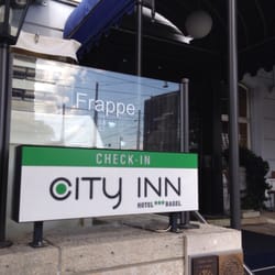 Hotel City Inn - Hotel City Inn sign in front of Hotel Euler - they share the same front desk!