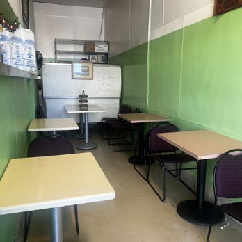 Abas Hamidi Afghan Cuisine - The side of the small eatery where there are tables and chairs - Afghan Near Me - Concord, California Abas Hamidi Afghan Cuisine - The side of the small eatery where there are tables and chairs - Afghan Near Me - Concord, California