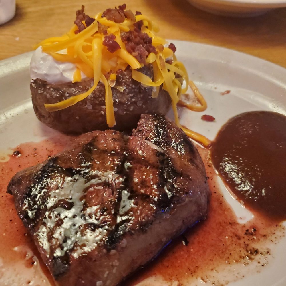 Texas Roadhouse - 8 oz. Medium-rare sirloin with a loaded baked potato. - American Near Me - Blue Springs, Missouri Texas Roadhouse - 8 oz. Medium-rare sirloin with a loaded baked potato. - American Near Me - Blue Springs, Missouri