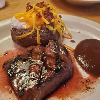 Texas Roadhouse - 8 oz. Medium-rare sirloin with a loaded baked potato. - American Near Me - Blue Springs, Missouri Texas Roadhouse - 8 oz. Medium-rare sirloin with a loaded baked potato. - American Near Me - Blue Springs, Missouri