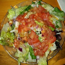 Pretty but tasteless salad served with gross lettuce.