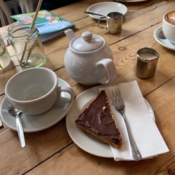 Huddle Cafe - Home made millionaires short bread and a cup of tea