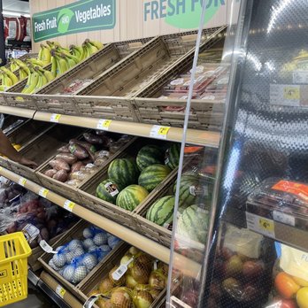 Dollar General - a man shopping in a grocery store - Grocery Near Me - Lake Wales, Florida