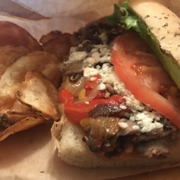 Blackened steak on herb crusted bread. Blackened steak on herb crusted bread.