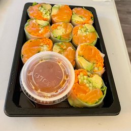 a tray of sushi rolls a tray of sushi rolls
