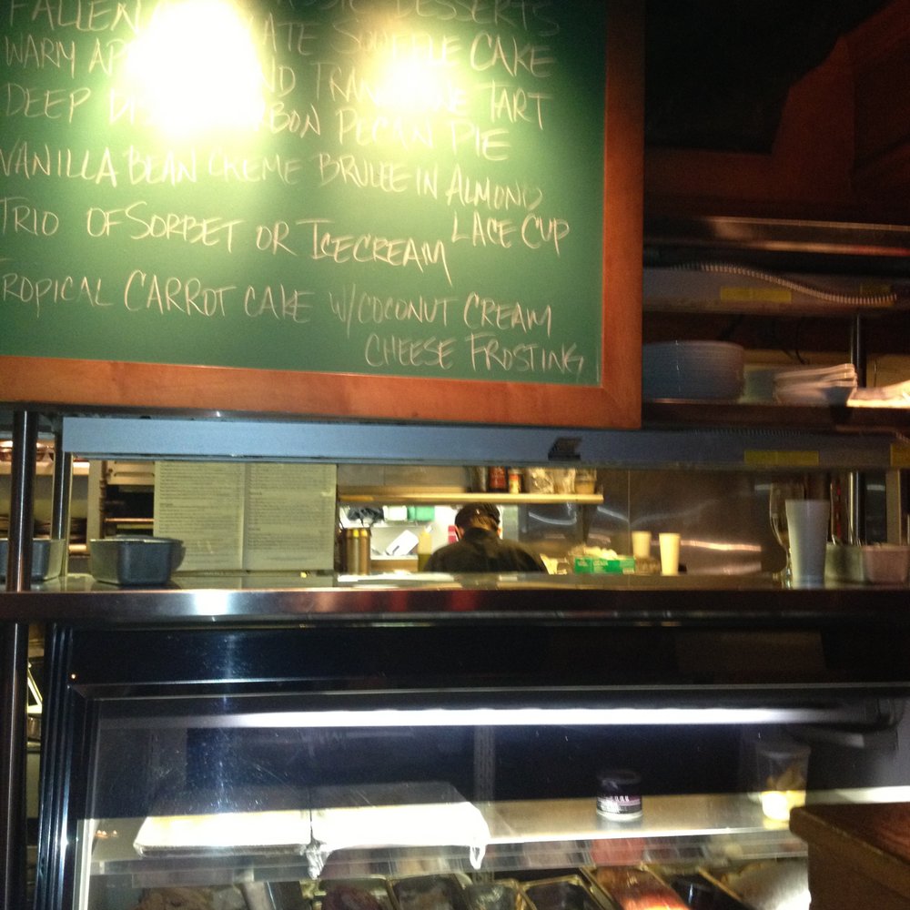 Cafe Maxx - View of the posted menu and meat display. - Seafood Near Me - Pompano Beach, Florida
