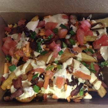 Wilk's Booth - a box of loaded fries - Food Trucks Near Me - Calgary, Alberta