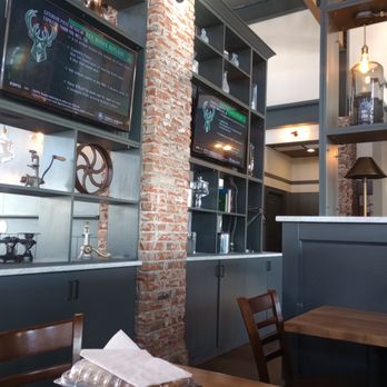 The Goat Hilliard - Interior design with exposed bricks on pillars - Bars Near Me - Hilliard, Ohio