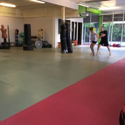 Combat Krav Maga - Find us on the Northwest Corner of Swan & Broadway, next door to Kon-Tiki