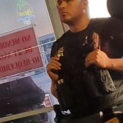 Guadalajara Sports Bar - This guy with guns and mace