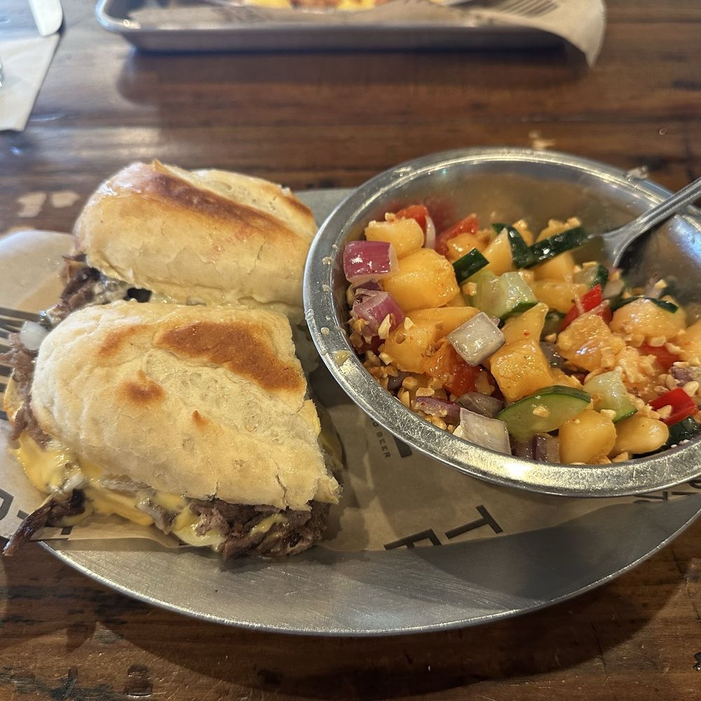 The Mule - Philly Cheese Steak and Seasonal cucumber salad - Bars Near Me - Oklahoma City, Oklahoma The Mule - Philly Cheese Steak and Seasonal cucumber salad - Bars Near Me - Oklahoma City, Oklahoma