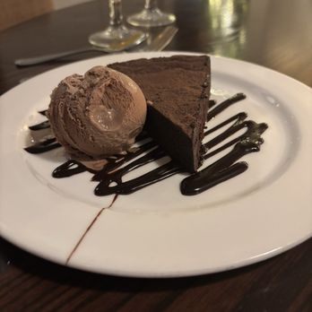 Mirabelle Restaurant & Tavern - Flourless Chocolate Cake - New American Near Me - Stony Brook, New York Mirabelle Restaurant & Tavern - Flourless Chocolate Cake - New American Near Me - Stony Brook, New York