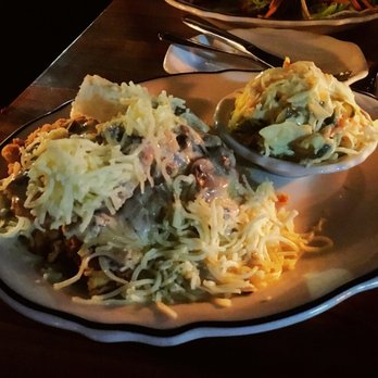 Jacob's Pickles - Chicken n biscuit smothered with mushroom gravy and cheese with a side of pickled slaw - Comfort Food Near Me - New York, New York