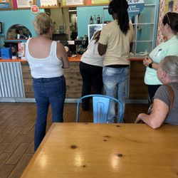 People waiting for their mobile orders